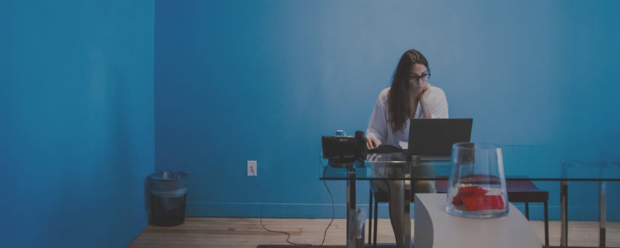 freelance designer sitting at desk