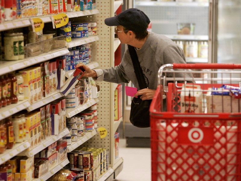 A shopper looks at grocery items at a Target store in Los Angeles, California August 18, 2009. REUTERS/Fred Prouser 