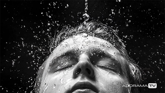 black and white portrait with water