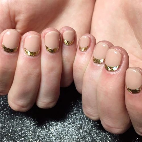 @stephanievezilj rocking the gold foil cuffs with a simple and...