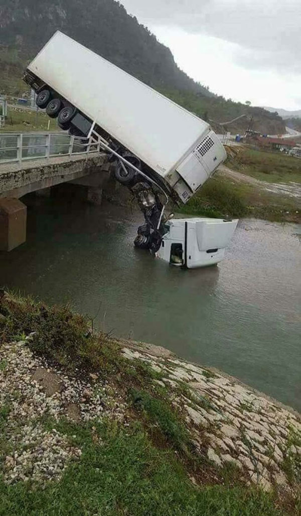 Here we see a rare photo of a truck in its natural habitat, drinking water from a river