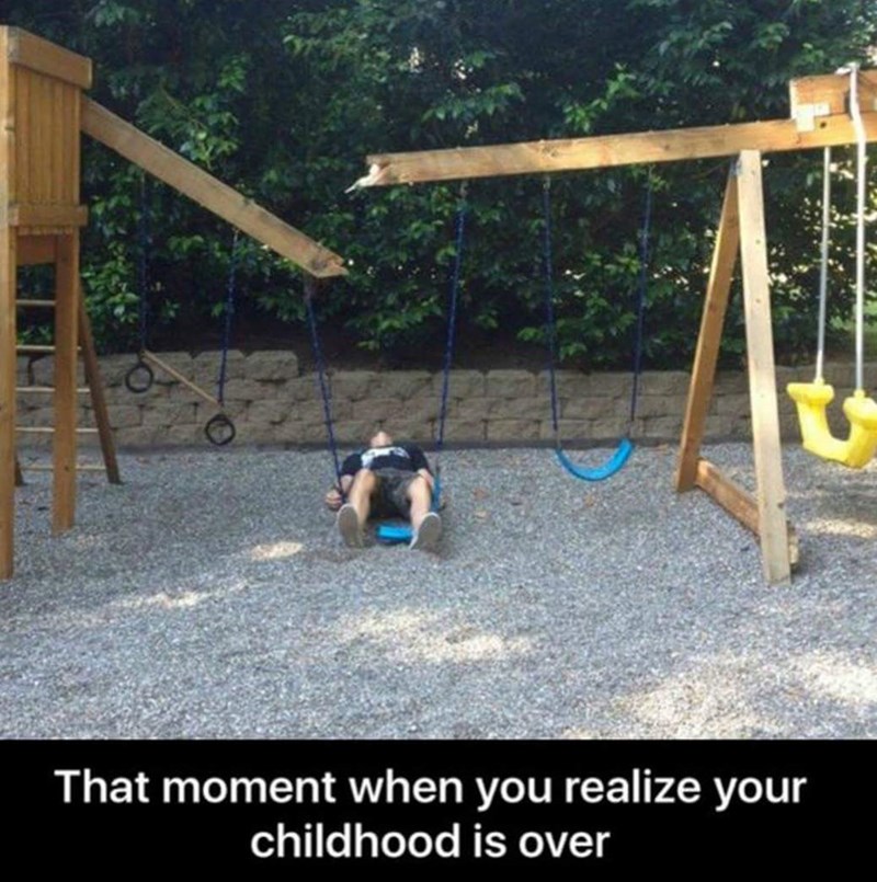 Funny shocking picture of a broken child's swing set, with a non-child person lying on the ground in shock, might be staged after the fact.