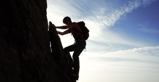 Mountain climber; business challenges concept