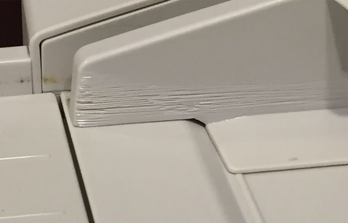 Fax Machine/Scanner Used So Heavily, The Paper Has Cut The Plastic Over Time