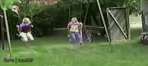 girls cape gets caught on a swing