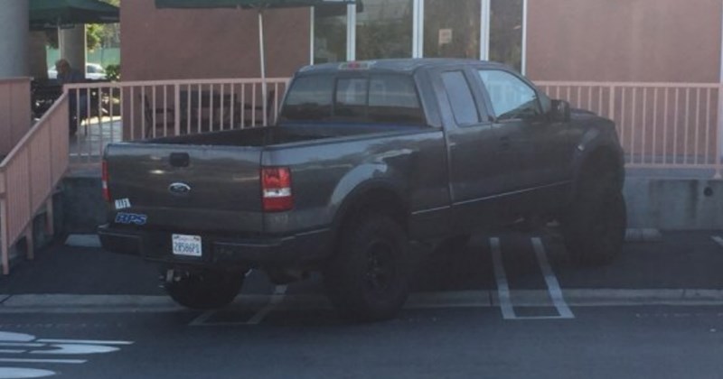 guy parks his truck taking up three spots - cover image to a list of people who suck