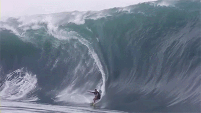surfer wipes out inside of a giant half pipe
