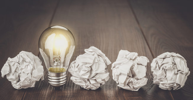 Lightbulb and crumpled paper; business planning concept
