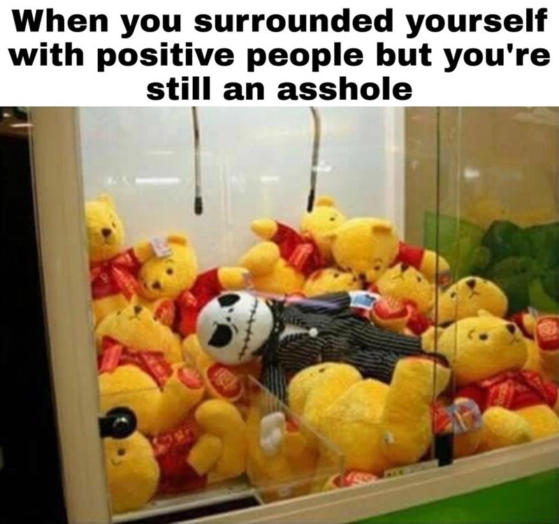Funny meme of Winnie the Poos and a Jack from the nightmare before christmas in a claw machine