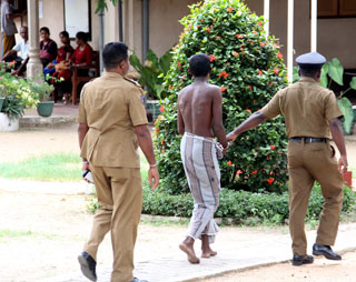  Dirty sinner of Giribave who raped and killed schoolgirl ... taken away with his sarong on