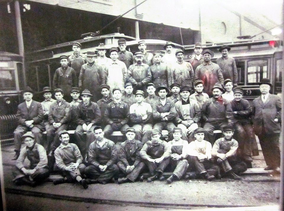 Trolley Mechanics in front of the Car Barns on St. Joe Avenue. Early 20th Century.
