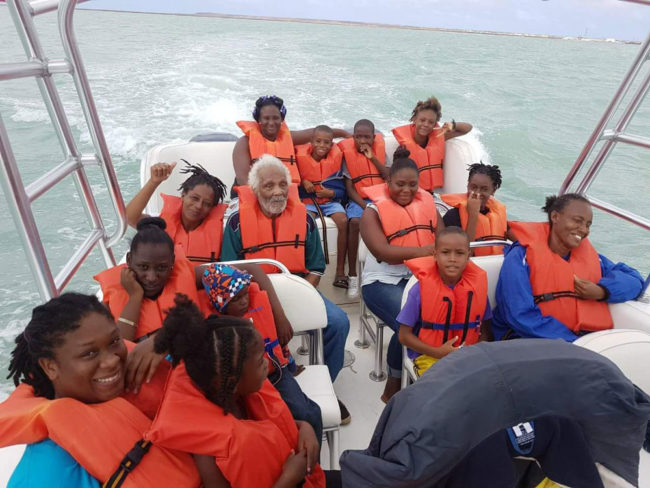 My cousin helping evacuate the island of Barbuda in preparation for a second hurricane hitting on saturday, the boat trip to Barbuda was loaded full with water, food and clothes. After all these people have lost they're still smiling