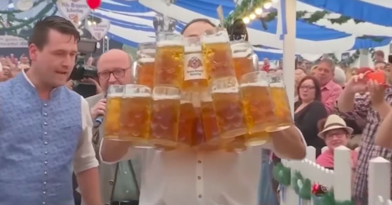 Video of German guy breaking the beer-carrying world record is pretty amazing.