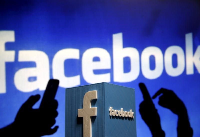 FILE PHOTO - A 3D plastic representation of the Facebook logo is seen in this illustration photo May 13, 2015. REUTERS/Dado Ruvic/Illustration/File Photo 