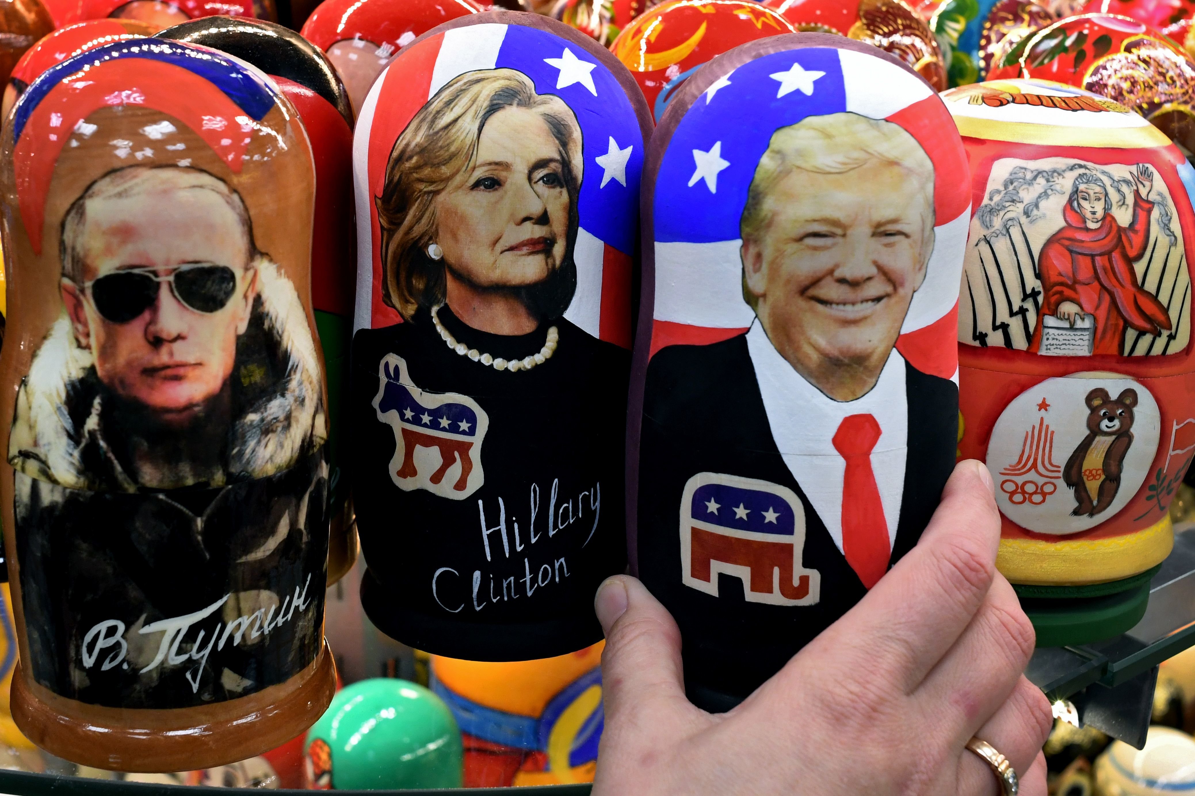 <strong>Traditional Russian wooden nesting dolls depicting Russia's President Vladimir Putin, US Democratic presidential nominee Hillary Clinton and US Republican presidential nominee Donald Trump on sale at a gift shop in central Moscow on 8 November 2016</strong>