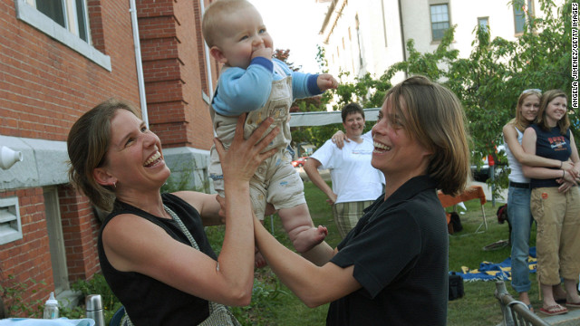 Lara Ramsey, left, and her partner of eight years, Jane Lohmann, play with their 7-month-old son, Wyatt Ramsey-Lohmann. The two wed in 2004 after Massachusetts approved same-sex marriage. Massachusetts was the first state to do so.