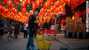 What\'s with the bucket, pal?. No cleaning allowed on the first day of Lunar New Year. 