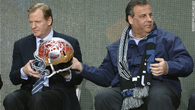 New Jersey Governor Chris Christie takes a welcome break from recent political controversies to share a moment with NFL Commissioner Roger Goodell in the build up to Super Bowl XLVII.