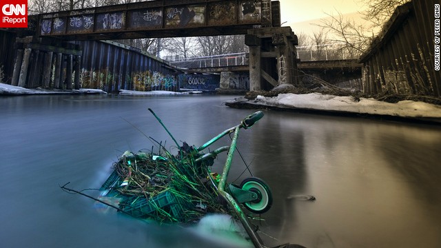 A cart sinks in the Kinnickinnic River in Milwaukee, Wisconsin. 