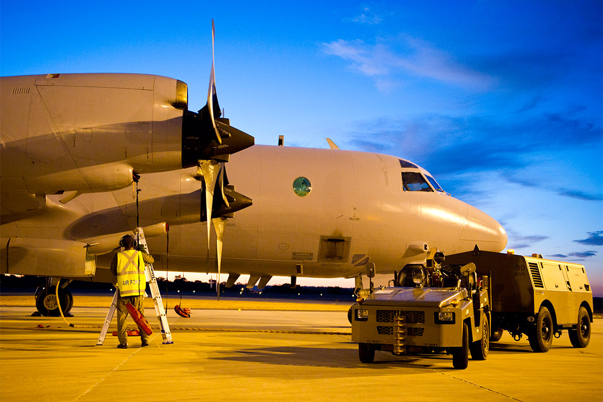 A Royal Australian Air Force AP-3C Orion aircraft from 10 Squadron, No 92 Wing, has post-flight checks conducted by maintenance personnel after its arrival at RAAF Base Pearce, Western Australia