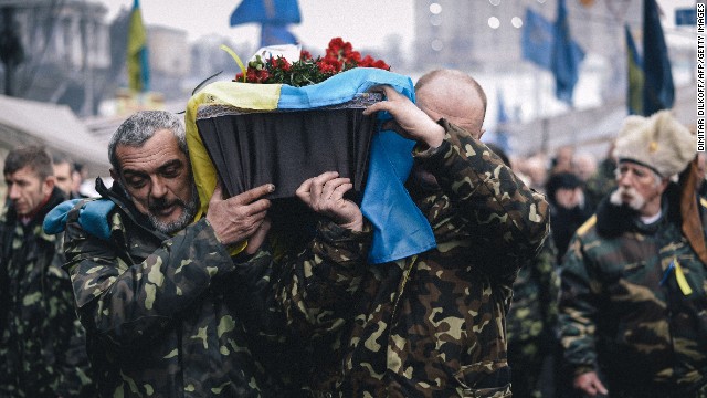 The coffin of a man killed near Maidan Square is carried through central Kiev on Thursday, March 6. Ukrainian officials and Western diplomats accuse Russia of sending thousands of troops into the Crimea region in the past week, a claim Russia has denied. The crisis in the former Soviet republic has revived concerns of a return to Cold War relationships. Follow the evolving story on CNN's live blog.