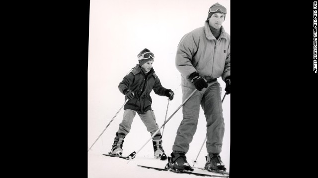Capt. Mark Phillips, then-husband of Princess Anne, skies with his son, Peter, in Morzine, France, in January 1986. 