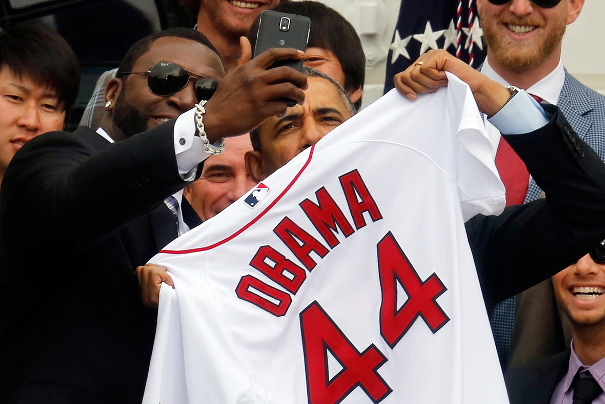 US President Barack Obama poses with David Ortiz for a 