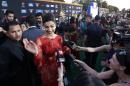 Indian film star Deepika Padukone walks the green carpet as she arrives for the 15th annual International Indian Film Awards on Saturday, April 26, 2014, in Tampa, Fla. (AP Photo/Brian Blanco)