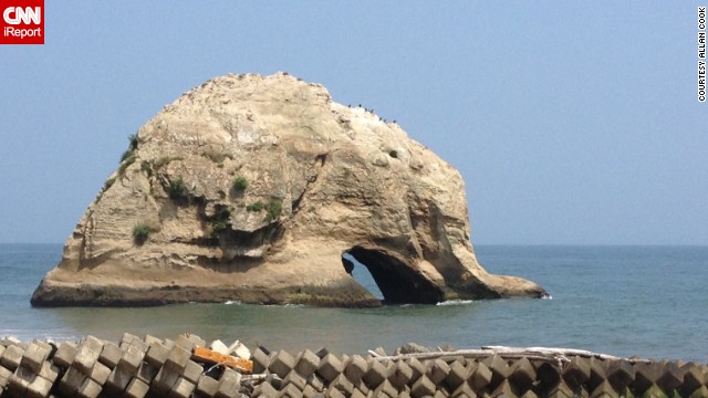 This <a href='http://ift.tt/1hGmtYy'>elephant-shaped rock</a> in the Ibaraki Prefecture dips its trunk into the sea. 