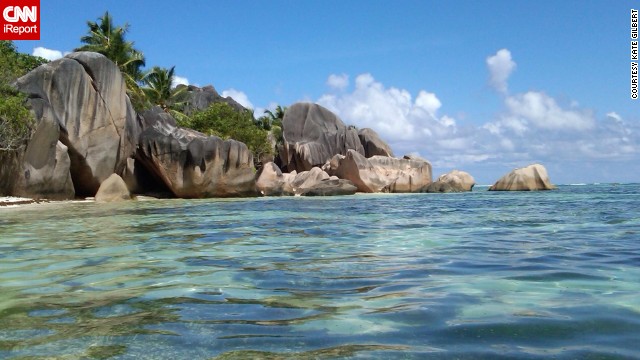 The calm topaz waters and clear blue skies at <a href='http://ift.tt/1hGmvQ7'>Anse Source D'Argent</a> on the island of La Digue are a vision of serenity. 
