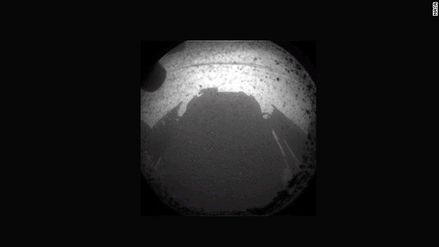 Another of the first images beamed back from NASA's Curiosity rover on August 6 is the shadow cast by the rover on the surface of Mars.