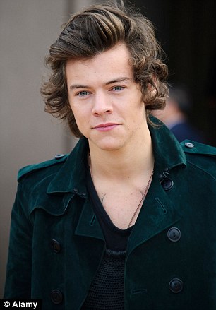 DTM1AG Harry Styles arrives for the Burberry Prorsum Womenswear collection.