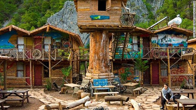 These simple wooden bungalows set amid the branches have long been popular with backpackers who like to party hard. 