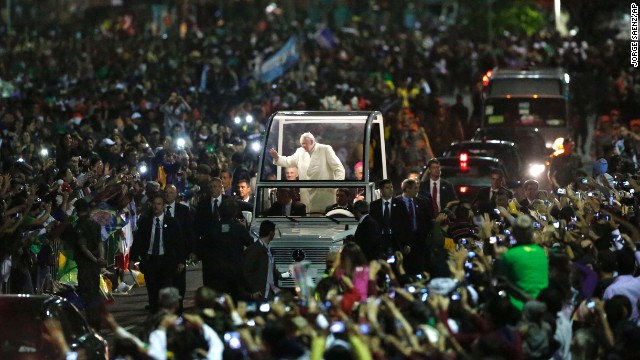 Crowds swarm the Pope as he makes his way through World Youth Day in Rio de Janeiro on July 27. According to the Vatican, 1 million people turned out to see the Pope. 