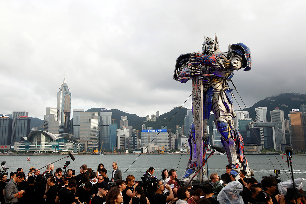 A model of the Transformers character Optimus Prime is displayed on the red carpet before the world premiere of the film 'Transformers: Age of Extinction' in Hong Kong