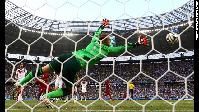  Andre Ayew scores Ghana's equalizer with a header past Germany goalkeeper Manuel Neuer.