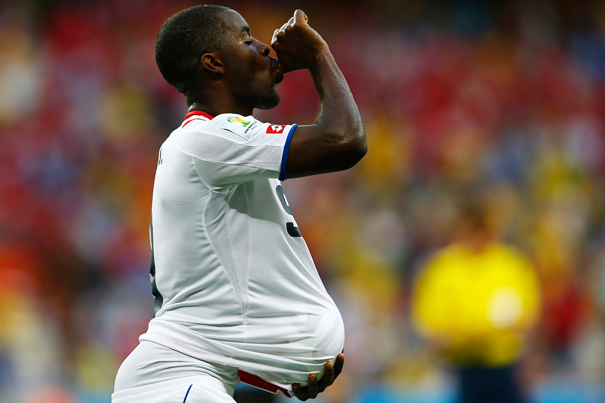 Costa Rica's Joel Campbell celebrates with the match ball after scoring against Uruguay during their World Cup Group D match at the Castelao stadium in Fortaleza.