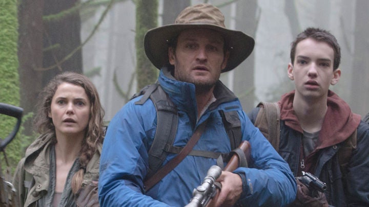 Keri Russell, Jason Clarke and Kodi Smit-McPhee in Dawn of the Planet of the Apes.