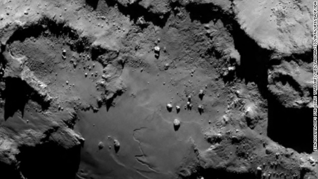 The spacecraft sent this image as it approached the comet on August 6. From a distance of 130 kilometers (nearly 81 miles), it reveals detail of the smooth region on the comet's "body" section. 