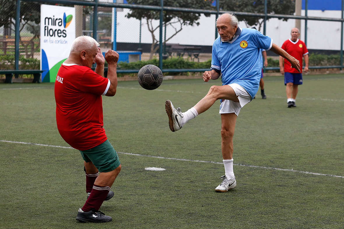 Elderly men play football in Miraflores, in Lima, in a weekly activity organised by the municipality
