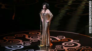 The character Celestina Warbeck is said to resemble singer Shirley Bassey, here performing at the 2013 Oscars.