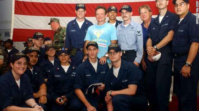 <a href='http://ift.tt/1kBdwYh'>Aurora Contreras</a> of the U.S. Navy says meeting Robin Williams aboard the USS Harry S. Truman was one of her fondest memories from her 2004 deployment in the Persian Gulf. Contreras is shown kneeling to the left of the soldier whom Williams was standing behind. "To see him there was a major highlight of our time onboard," she said.