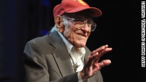 Zamperini, a University of Southern California alumnus, serves as a presenter at the Golden Goggle swimming awards in Los Angeles in 2011.
