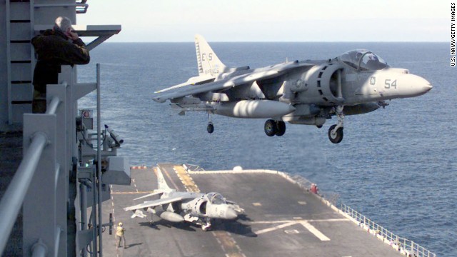 A AV-8B Harrier lands on board the USS Nassau on April 14, 1999, following a strike mission into Kosovo. The AV-8B Harrier is a single-engine ground-attack aircraft capable of vertical or short takeoff and landing. Though production of the aircraft ceased in 2003, the U.S. Marine Corps is looking at systems enhancements and plans to continue using Harriers well into the next decade.