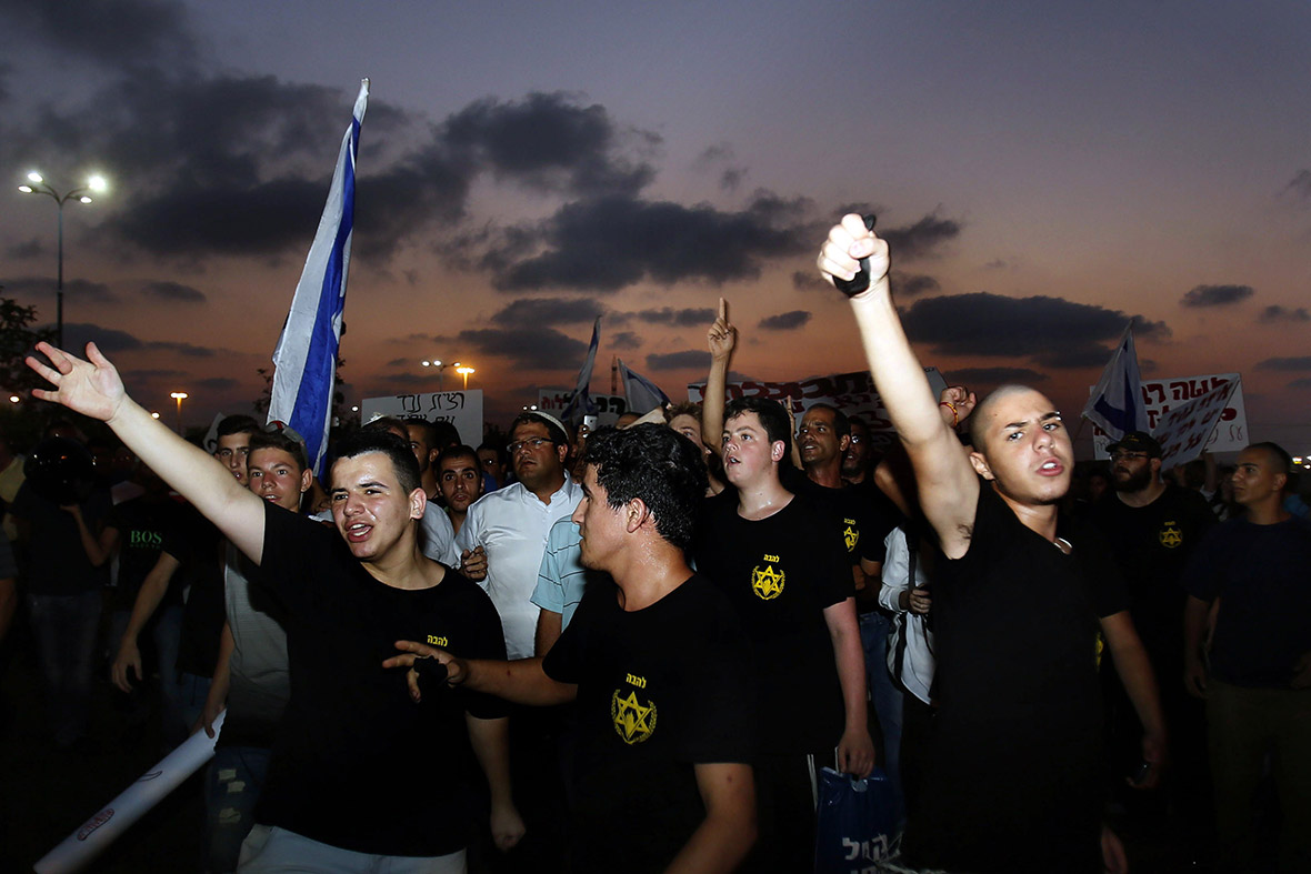 Protesters from the right-wing Organisation for Prevention of Assimilation in the Holy Land (LEHAVA) demonstrate outside the wedding hall
