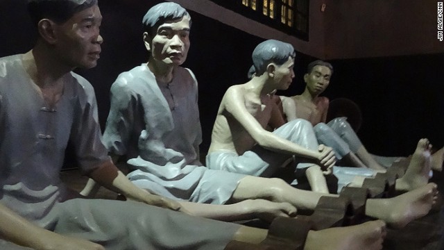 At Hoa Lo Prison, aka the "Hanoi Hilton," dim lighting and effigies of shackled inmates combine with grainy footage of aerial combat and a French guillotine used to behead Vietnamese prisoners in an attempt to create a level of psychological immersion that feels like incarceration. 
