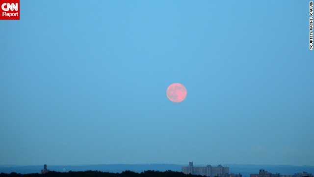 <a href='http://ift.tt/1wlMvrS'>Rachel Cauvin</a> photographed the supermoon hanging over the Bronx, New York, sky. The morning haze seemed to give the moon a red hue.