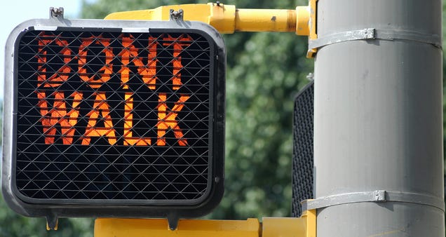 Why No One Bothers Putting Apostrophes in "Don't Walk" Signs