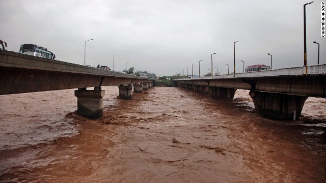 Floodwaters inch higher on a bridge on September 5 in Jammu, Indian-controlled Kashmir.