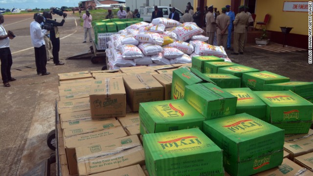 Boxes of aid, donated by Ghana's President and the chairman of the Economic Community Of West African States, sit in an airport in Conakry, Guinea, on September 15.